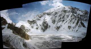 Фото 34 (L). Вершина Коштант-тау, перевал Одесса и верховь ледника Кундюм-Мижирги при спуске с перевала Утюг.